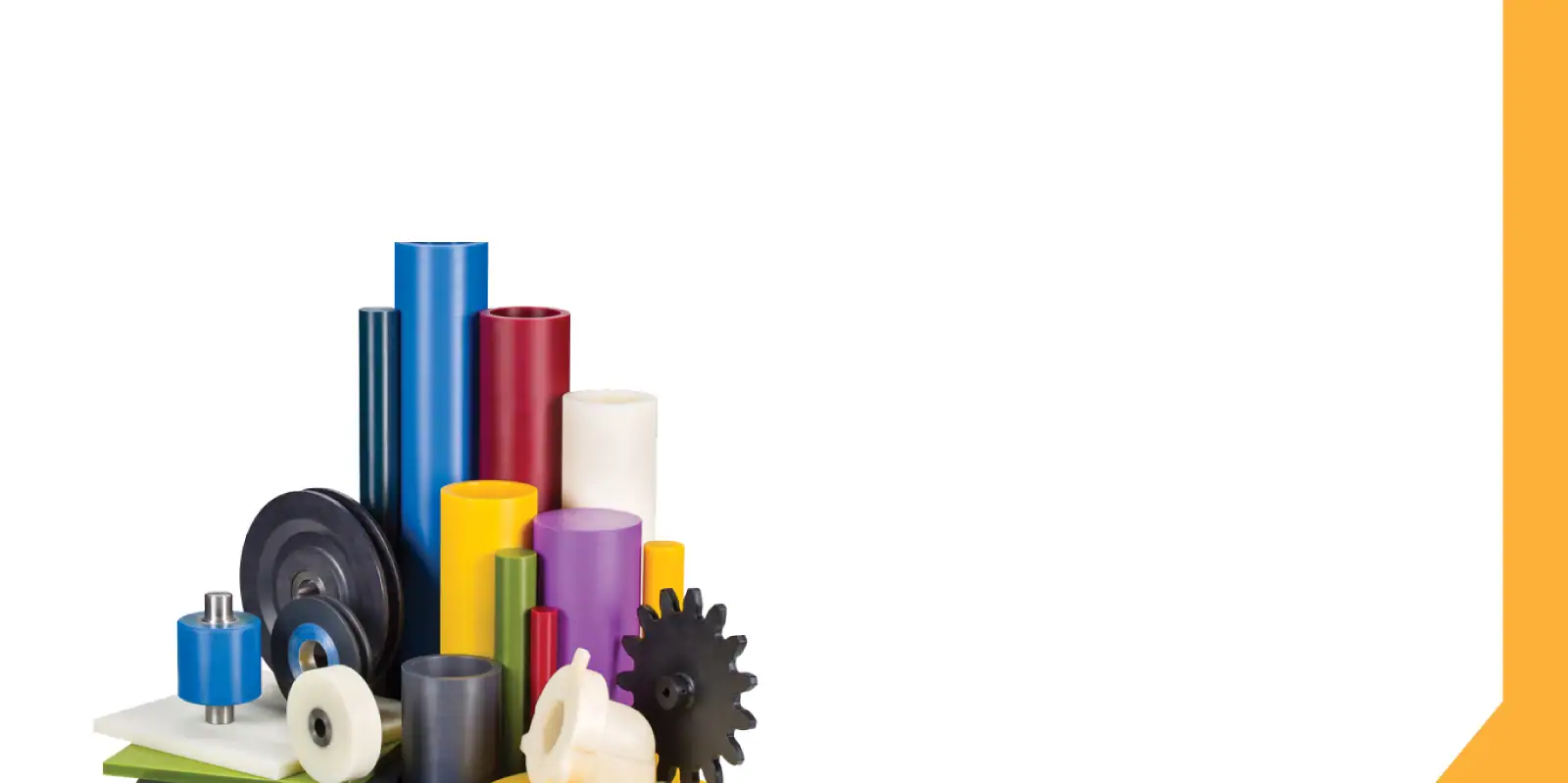 Assorted industrial rollers, gears, and plastic components used in manufacturing processes.