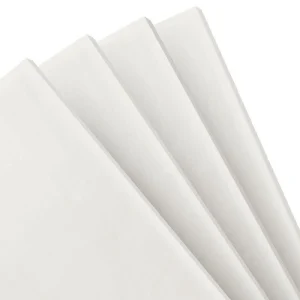 White acoustic ceiling tiles for optimal sound absorption and noise reduction in commercial spaces.
